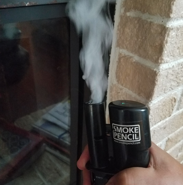 Smoke Pencil in a Fireplace