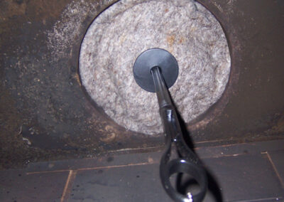 round Flueblocker installed below the fireplace damper