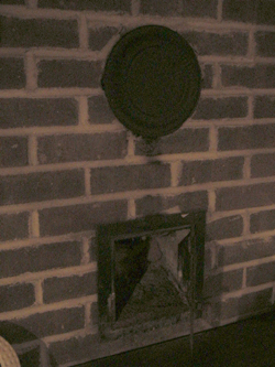 plug a leftover chimney pipe in my wall